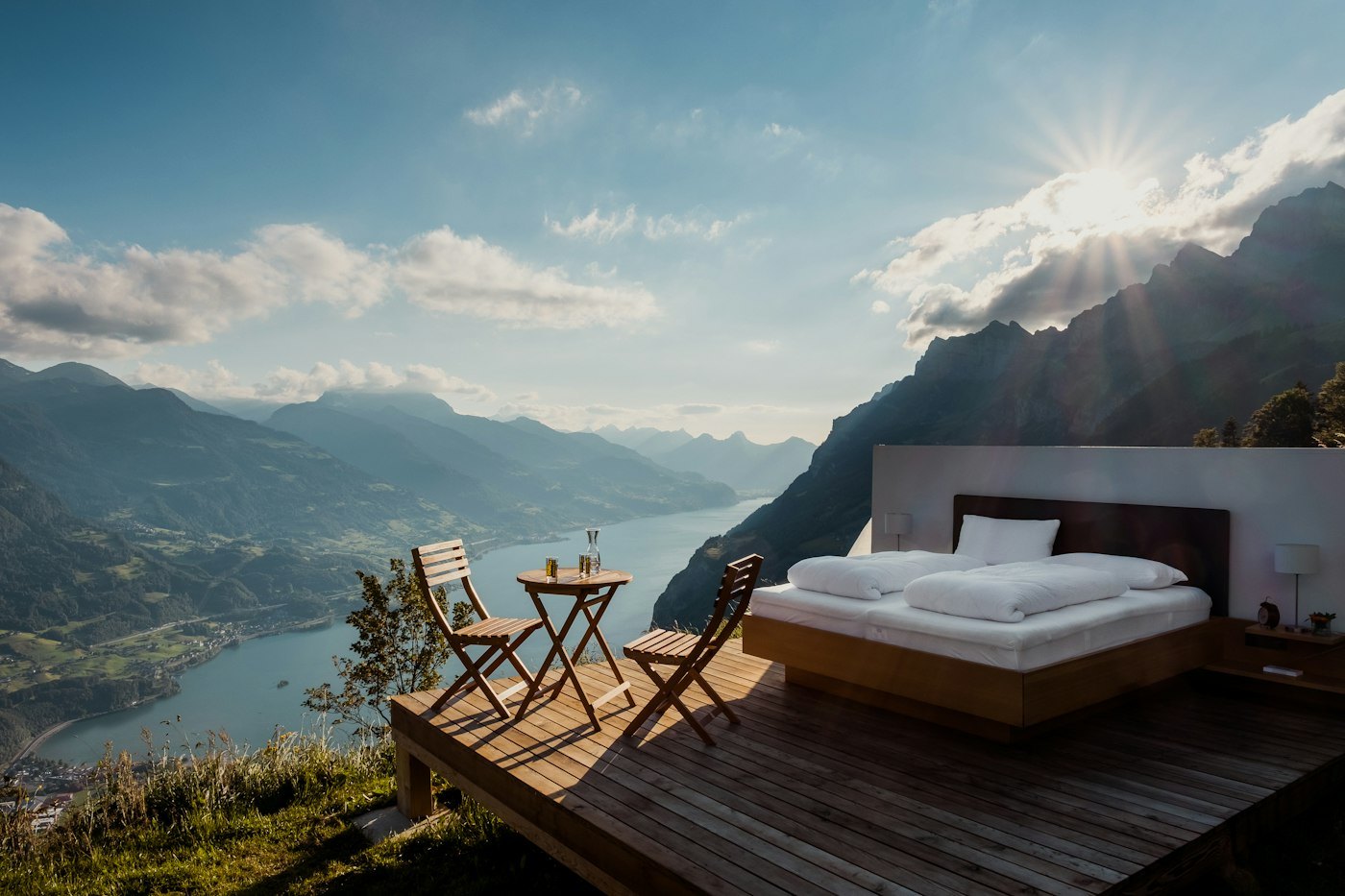 Luxury Suite — private terrace bed facing the mountains under open sky